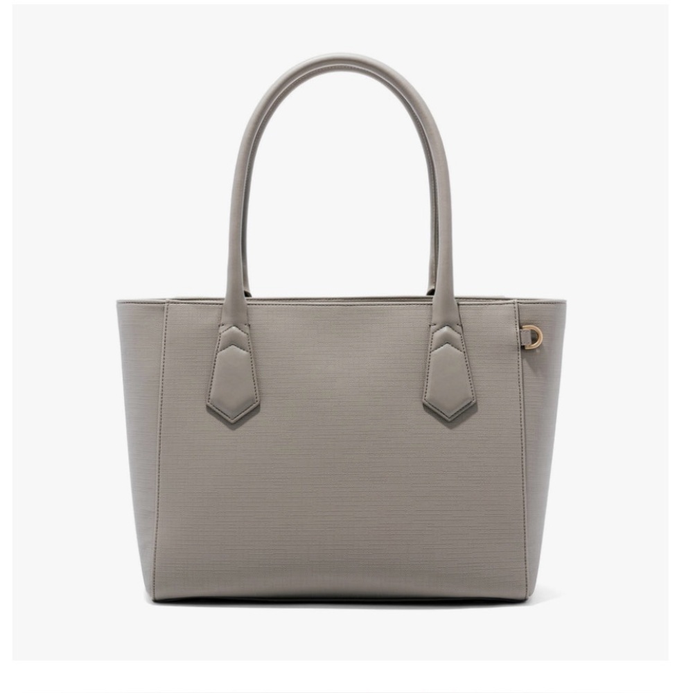 Dagne Dover Classic Signature Tote. Color: Bleeker Blush (light gray tone)